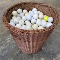 BASKET OF USED GOLF BALLS