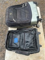 2 suitcases, one leather