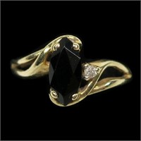14K Yellow gold marquise cut black onyx ring in a