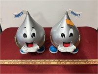 2 plastic Hershey’s Kisses dispensers