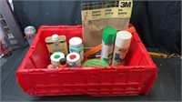 Tote of paint supplies