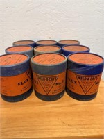 9 Empty Weld-A-Cat Flux Canisters