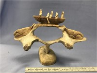 10 1/2" x 13" bone vertebra with relief carvings o
