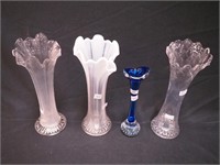 Four vases: three average 11" high, two white