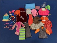 Assorted Barbie and other doll clothes, shoes and