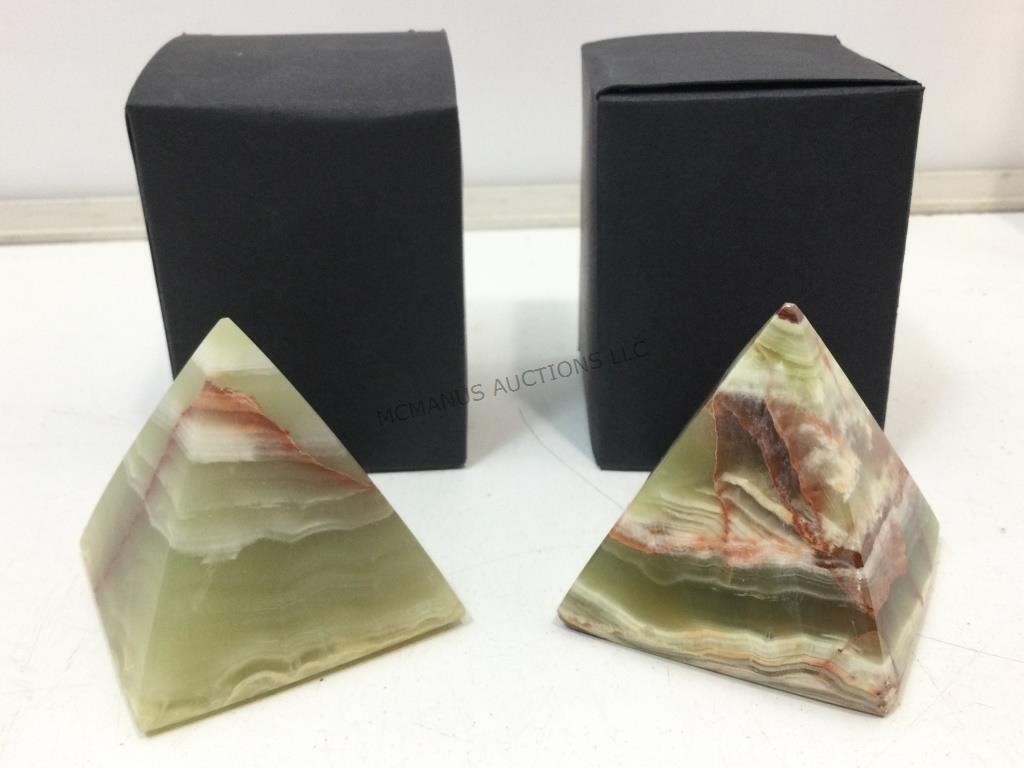 2 carved stone Onyx pyramids . Kalifano.