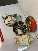 Flat of various craft items and tin of buttons