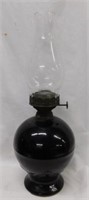 Antique black glass oil lamp, 18" tall
