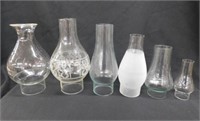 6 glass oil lamp chimneys, tallest is 9.5"