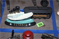 titanic door stop and trolley car, both cast iron