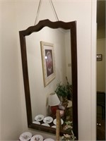 Hanging Framed Mirror in Hall