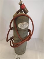 compressed gas bottle with hose