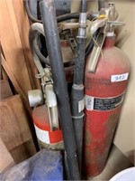 TWO FIRE EXTINGUISHERS