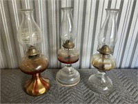 Oil lamps. 18 inches tall.