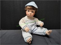 8.5" Sitting Boy Porcelain Doll