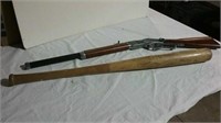 Wood bat and toy gun