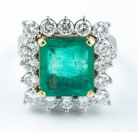 Platinum 18k emerald and diamond ring.