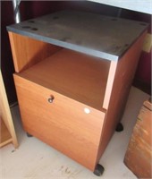 Rolling file cabinet. Measures: 22" Tall.