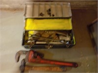 toolbox and pipe wrench