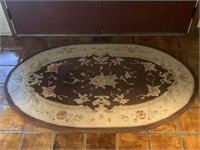 Oval entryway rug