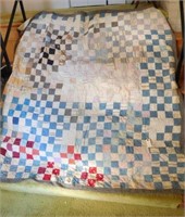 Hand stitched patchwork quilt