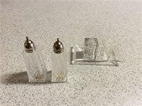 Two sets of Salt and Pepper Shakers