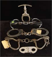 5 Antique hand cuffs