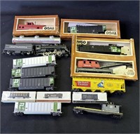 Group of vintage Tyco toy train and cars