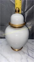 White and gold urn
