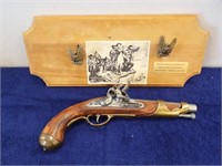 REPRODUCTION MOUNTED FLINTLOCK PISTOL....