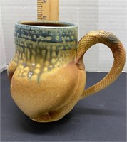 Snake skin coffee mug signed