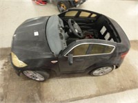 electric BMW, no seat, no battery