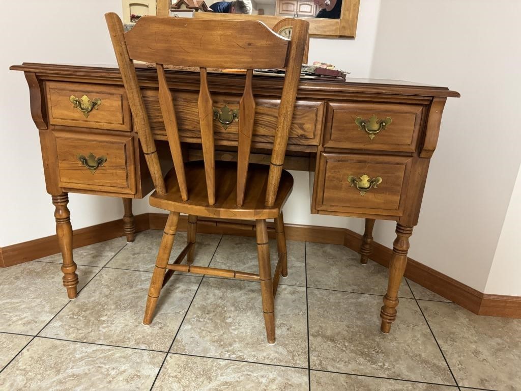 Kneehole desk and chair (in basement)