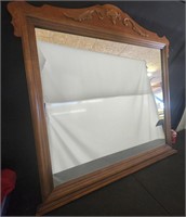 Large heavy wood-framed mirror