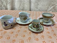 Set of tea cups and sauces