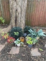 Large assortment of artificial outdoor plants,