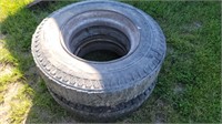 Pair 11-22.5 tires on open center rims