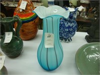 Large blue satin glass vase.