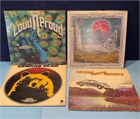 4-mixed LPs. All appear working.