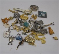 Group of cat costume jewelry including pins,