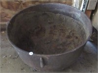 Large cast iron pot. Note: Missing leg and has
