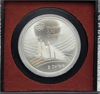 1976 Montreal Olympic Village $5 coin