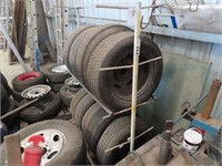 Rack of assorted wheels and tyres
