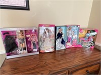 Vintage Barbie dolls and tea sets