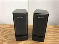 Two miniature Sony speakers