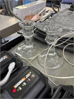 Two glass candleholders