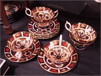 Six Royal Crown Derby teacups and saucers,