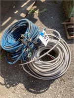 Two rolls metal encased electrical wire