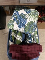 Large tote of outdoor chair cushions
