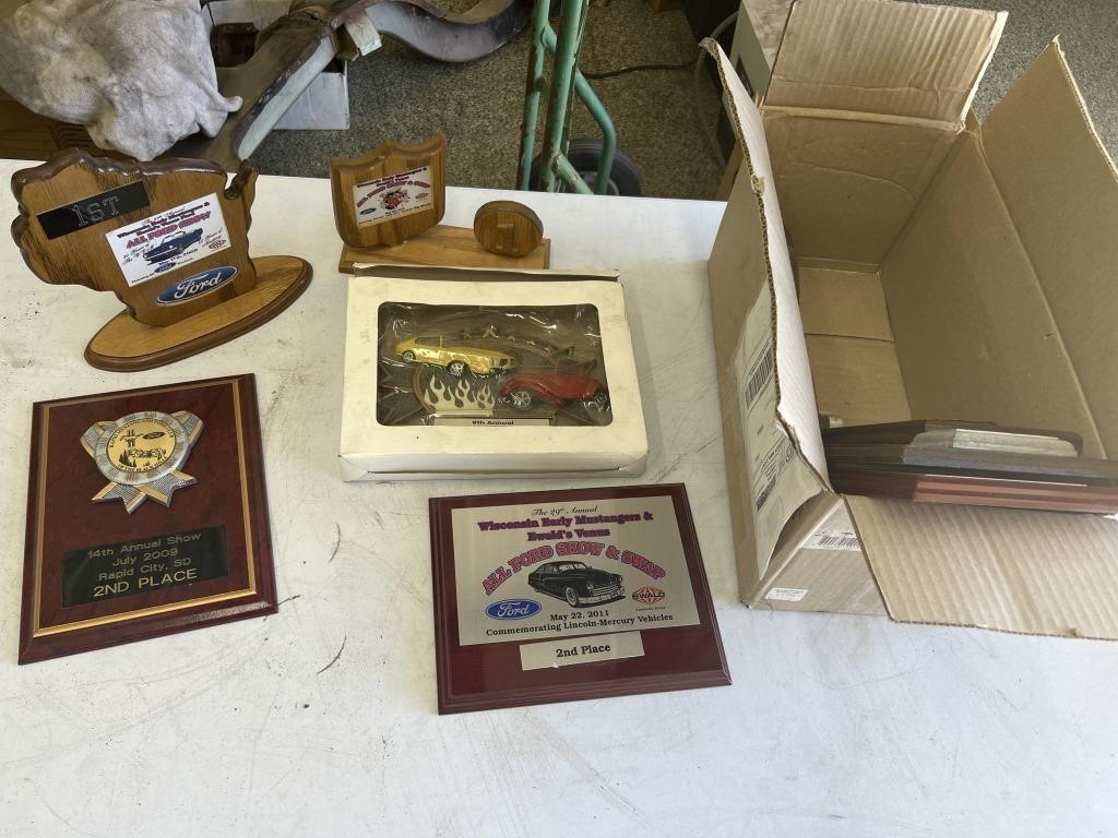 Assorted car show awards plaques